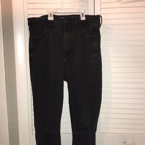 ripped at the knees high wasted jeans